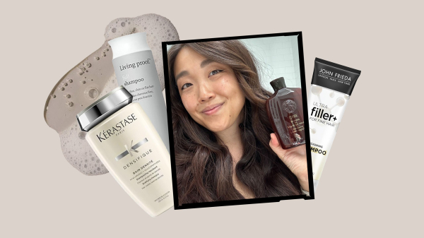 A photo of Allure contributor Christa Joanna Lee holding a bottle of Oribe Shampoo for Magnificent Volume in a black...